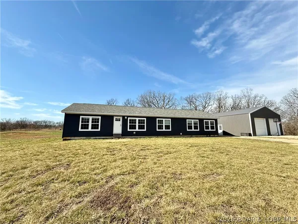 $594,500 | 3182 Big Buffalo Road, Stover, MO 65078