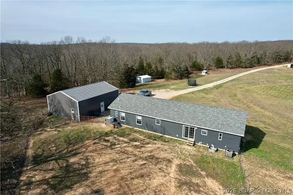 $594,500 | 3182 Big Buffalo Road, Stover, MO 65078
