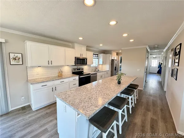 $594,500 | 3182 Big Buffalo Road, Stover, MO 65078