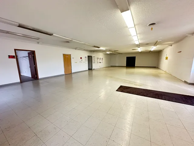 a view of kitchen with furniture and window