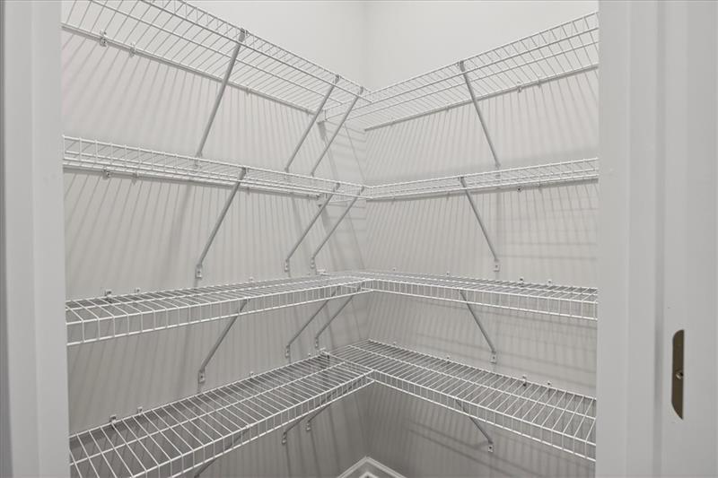 136 Brexley Drive Calhoun, GA 30701 - Photo 20 of 48 a view of a room with racks on the wall