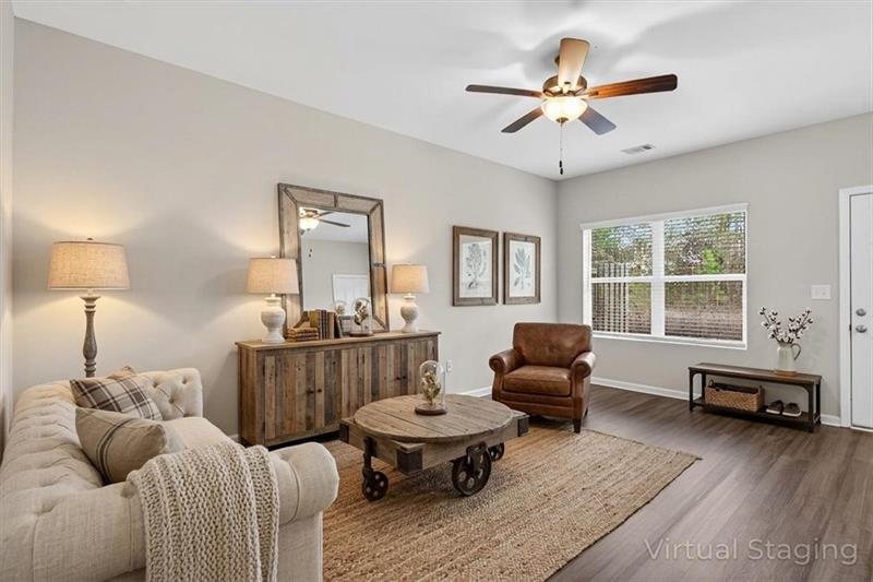 136 Brexley Drive Calhoun, GA 30701 - Photo 2 of 48 a living room with furniture and a window