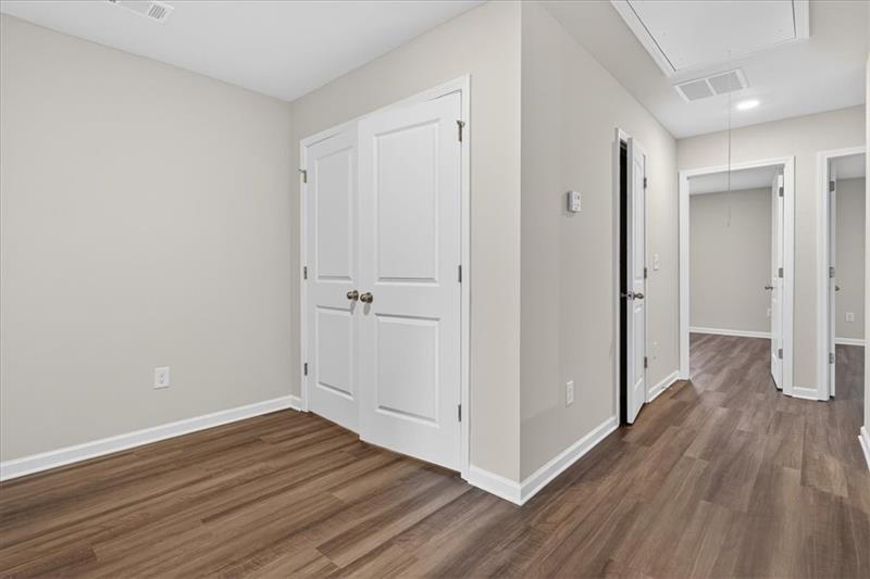 136 Brexley Drive Calhoun, GA 30701 - Photo 26 of 48 a view of a hallway with wooden floor