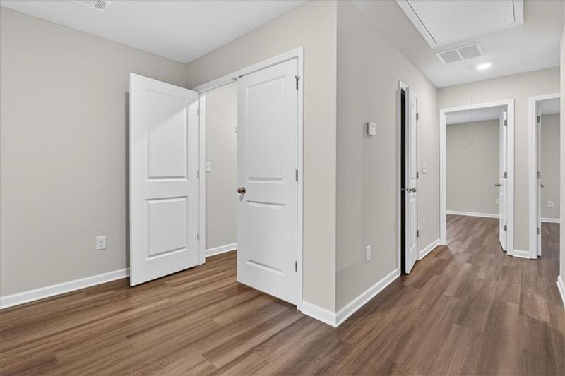 136 Brexley Drive Calhoun, GA 30701 - Photo 27 of 48 a view of a hallway with wooden floor