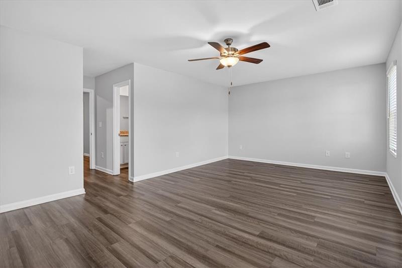 136 Brexley Drive Calhoun, GA 30701 - Photo 30 of 48 a view of an empty room with wooden floor