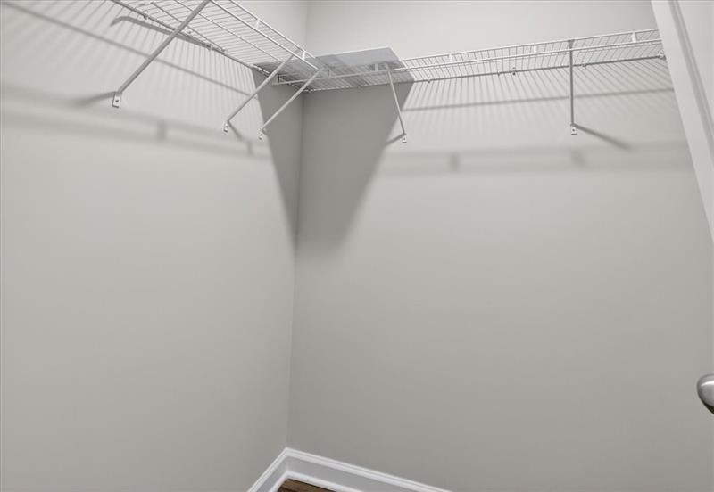 136 Brexley Drive Calhoun, GA 30701 - Photo 32 of 48 a view of a room with racks on the wall