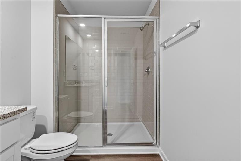 136 Brexley Drive Calhoun, GA 30701 - Photo 34 of 48 a bathroom with a glass shower door