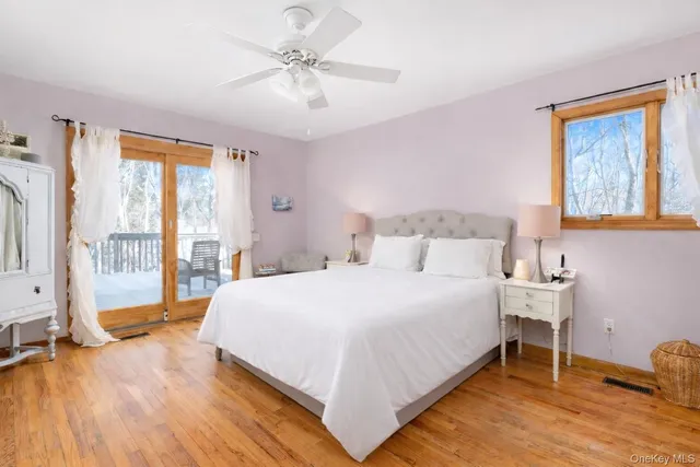 a bedroom with a bed and a table