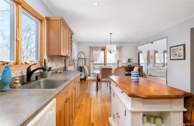 a large bedroom with a bed and large window