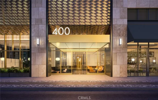 a view of a brick building with a street sign on the wall