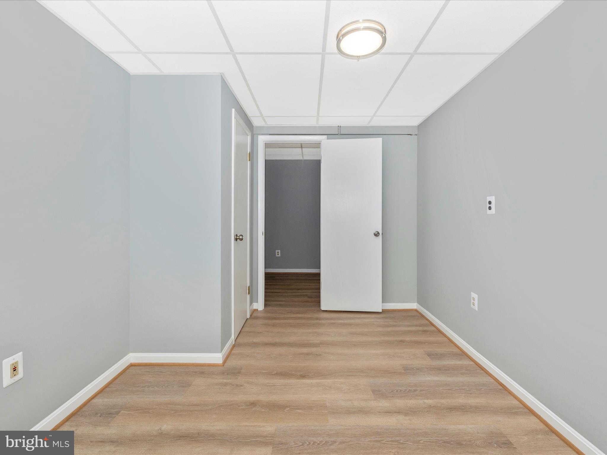 5154 Perry Road Mount Airy, MD 21771 - Photo 37 of 53 a view of a hallway with wooden floor