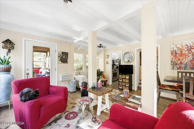 a living room with furniture and a window