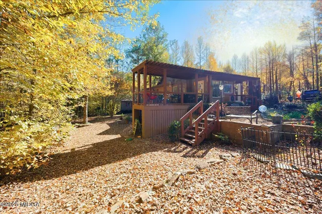 a backyard of a house with lots of green space