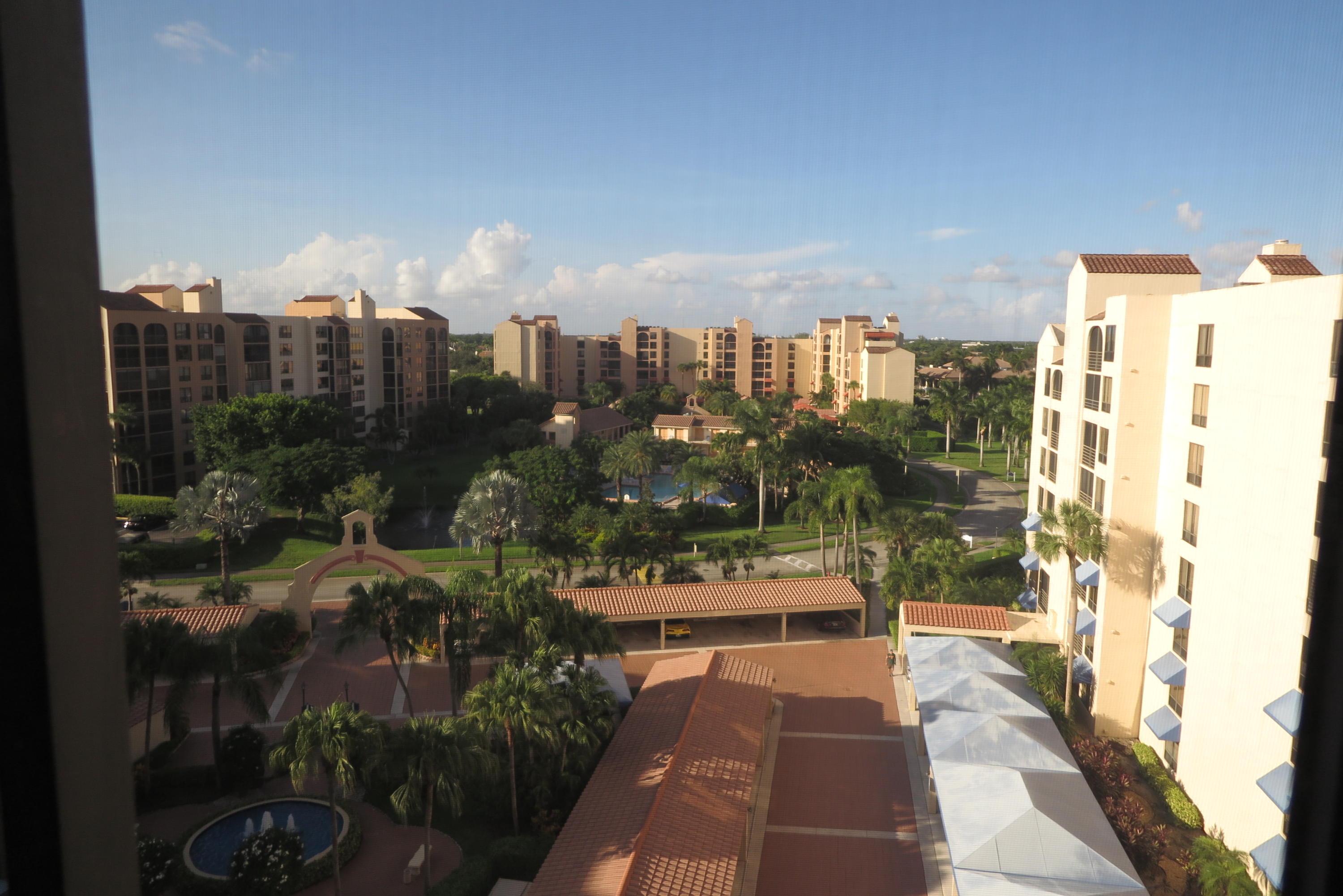 a view of a city with tall buildings