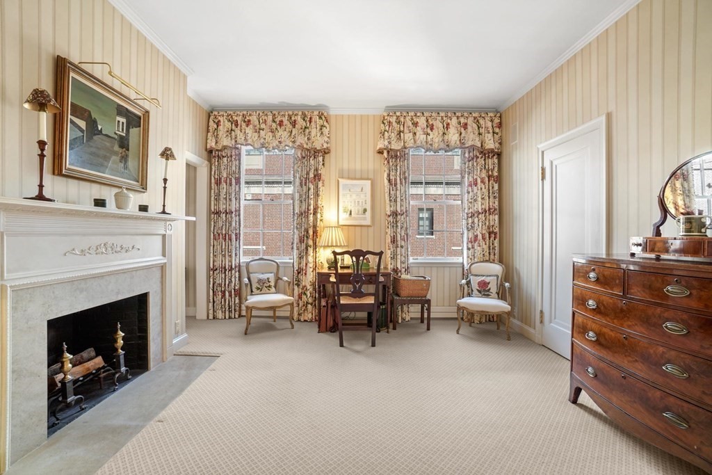 388 Beacon Street, Unit 3 Boston, MA 02116 - Photo 15 of 29 a living room with furniture and a fireplace