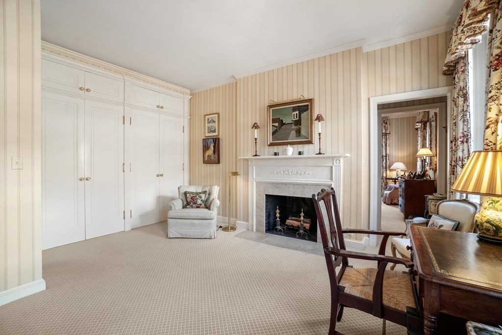 388 Beacon Street, Unit 3 Boston, MA 02116 - Photo 16 of 29 a living room with furniture and a fireplace