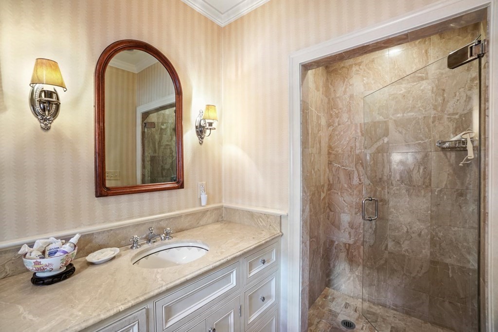 388 Beacon Street, Unit 3 Boston, MA 02116 - Photo 17 of 29 a bathroom with a granite countertop sink a mirror and shower