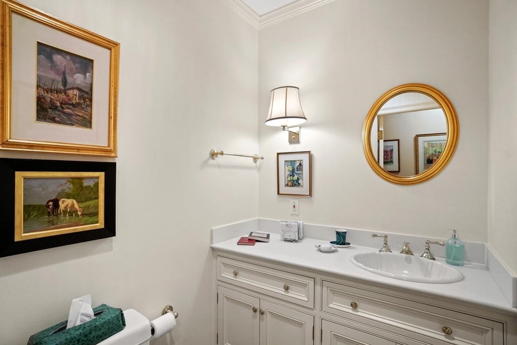 388 Beacon Street, Unit 3 Boston, MA 02116 - Photo 24 of 29 a bathroom with a granite countertop sink mirror and vanity
