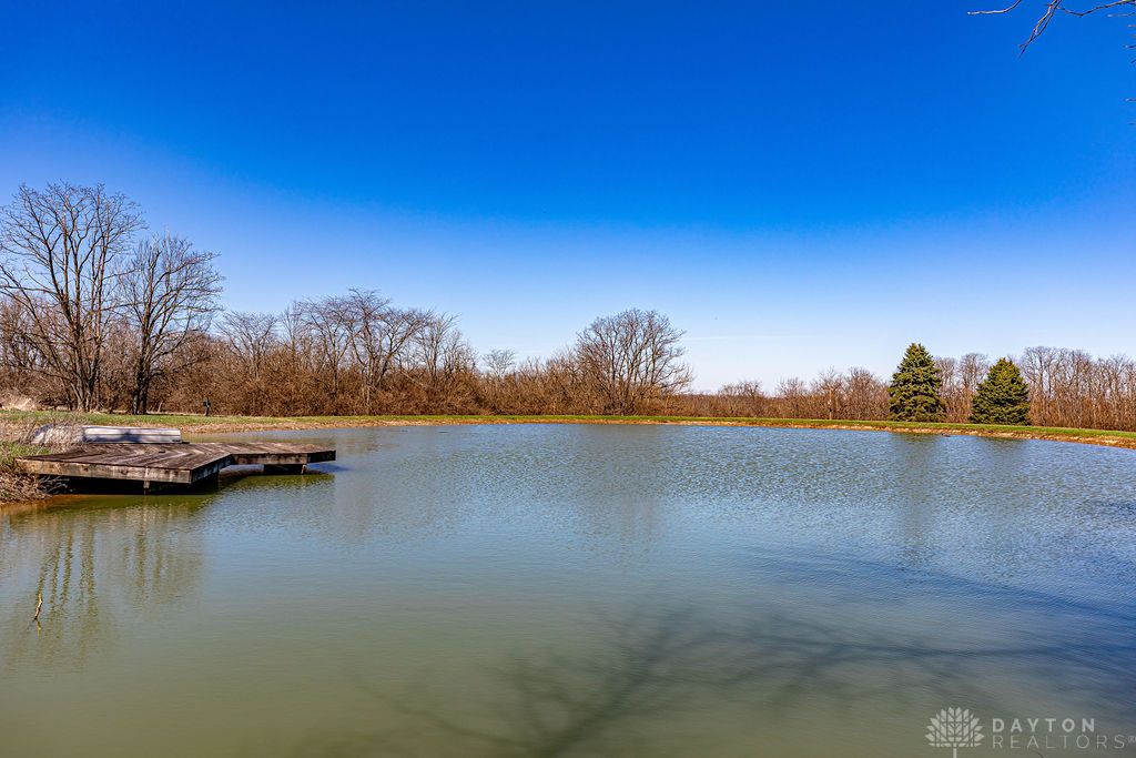 5740 Hendrickson Road Franklin, OH 45005 - Photo 46 of 51 Stocked pond with aerator, 17' wide dock and electric box.