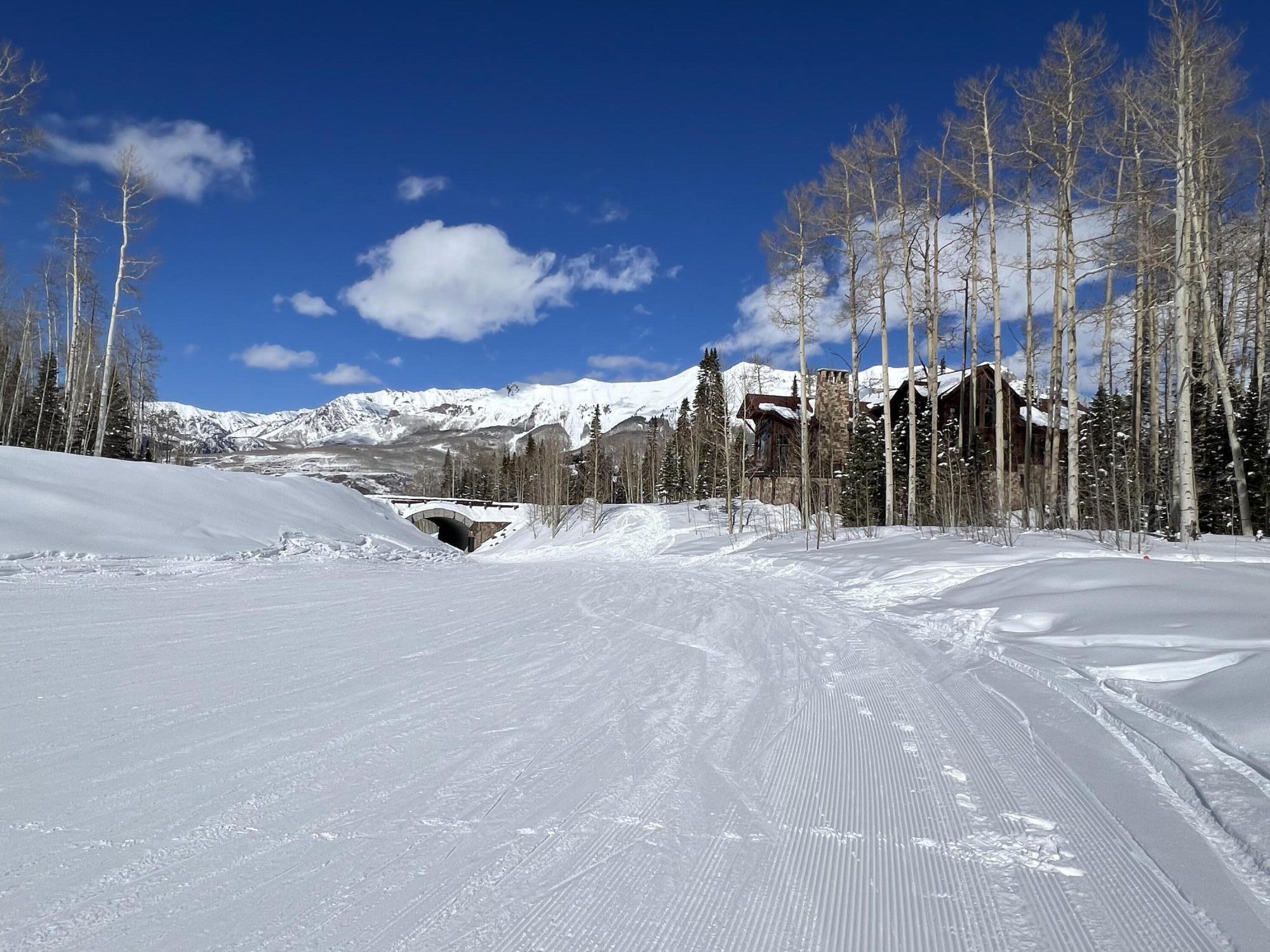 Tbd Benchmark Drive Mountain Village, CO 81435 - Photo 17 of 20 a view of a building with a snow on the road