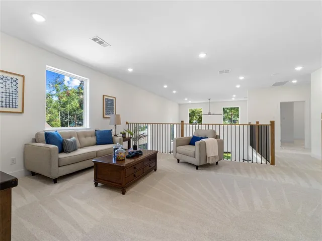 a bathroom with a sink and cabinets