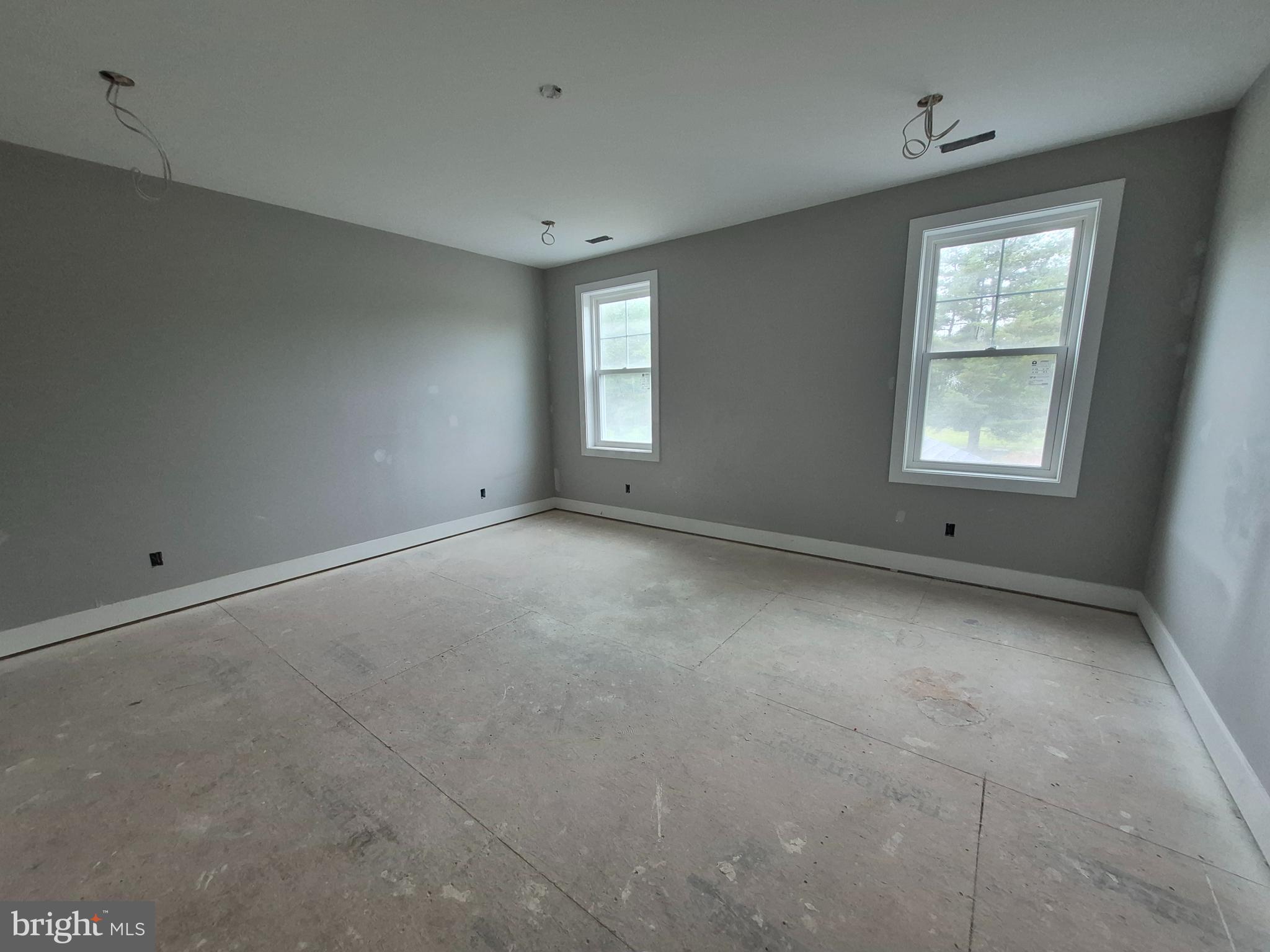 324 Bishop Hollow Road Newtown Square, PA 19073 - Photo 11 of 37 a view of an empty room with a window