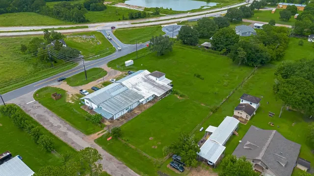 a view of a house with a big yard