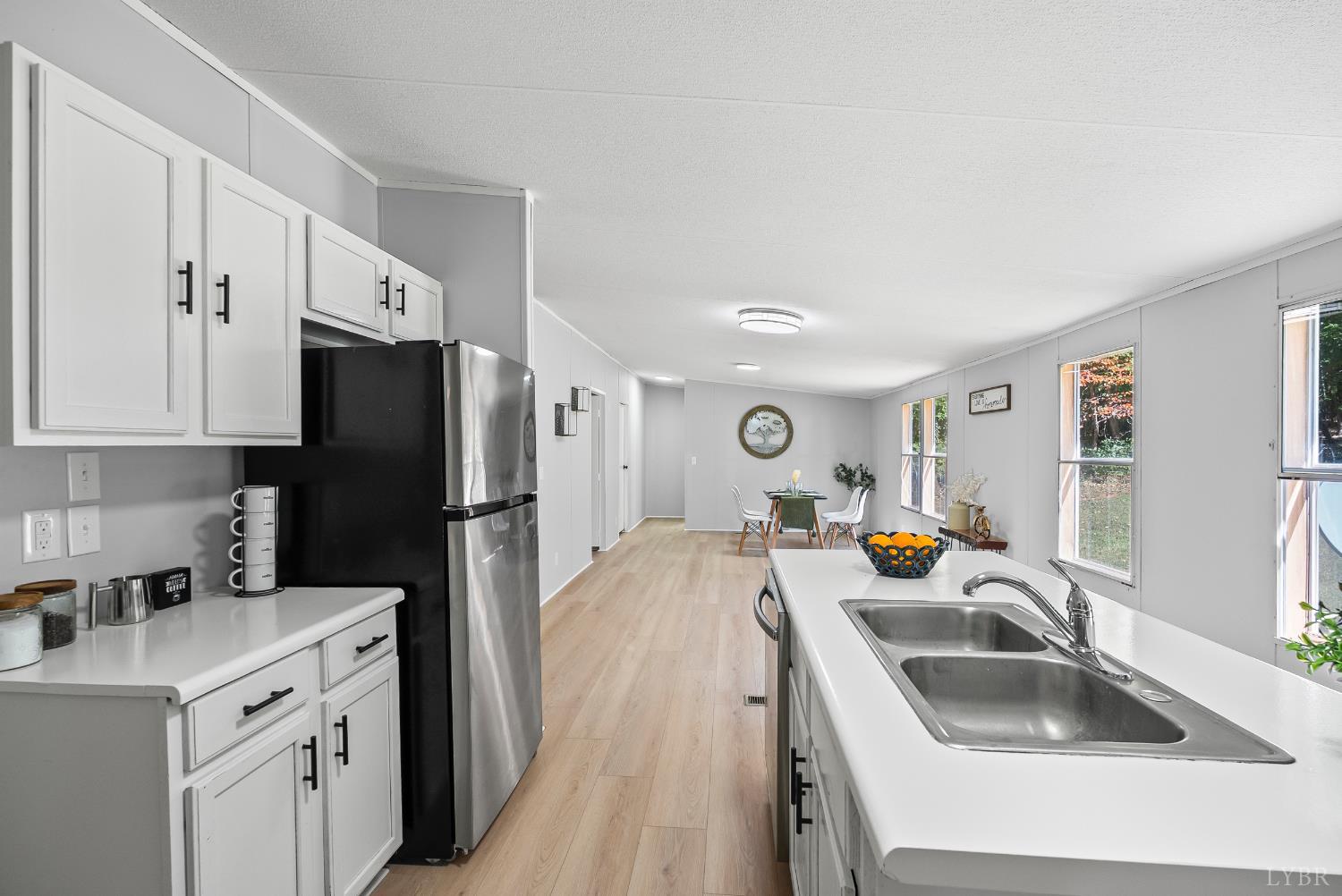 509 Oak Hill Road Prospect, VA 23960 - Photo 14 of 41 a kitchen with a sink a refrigerator and a sink