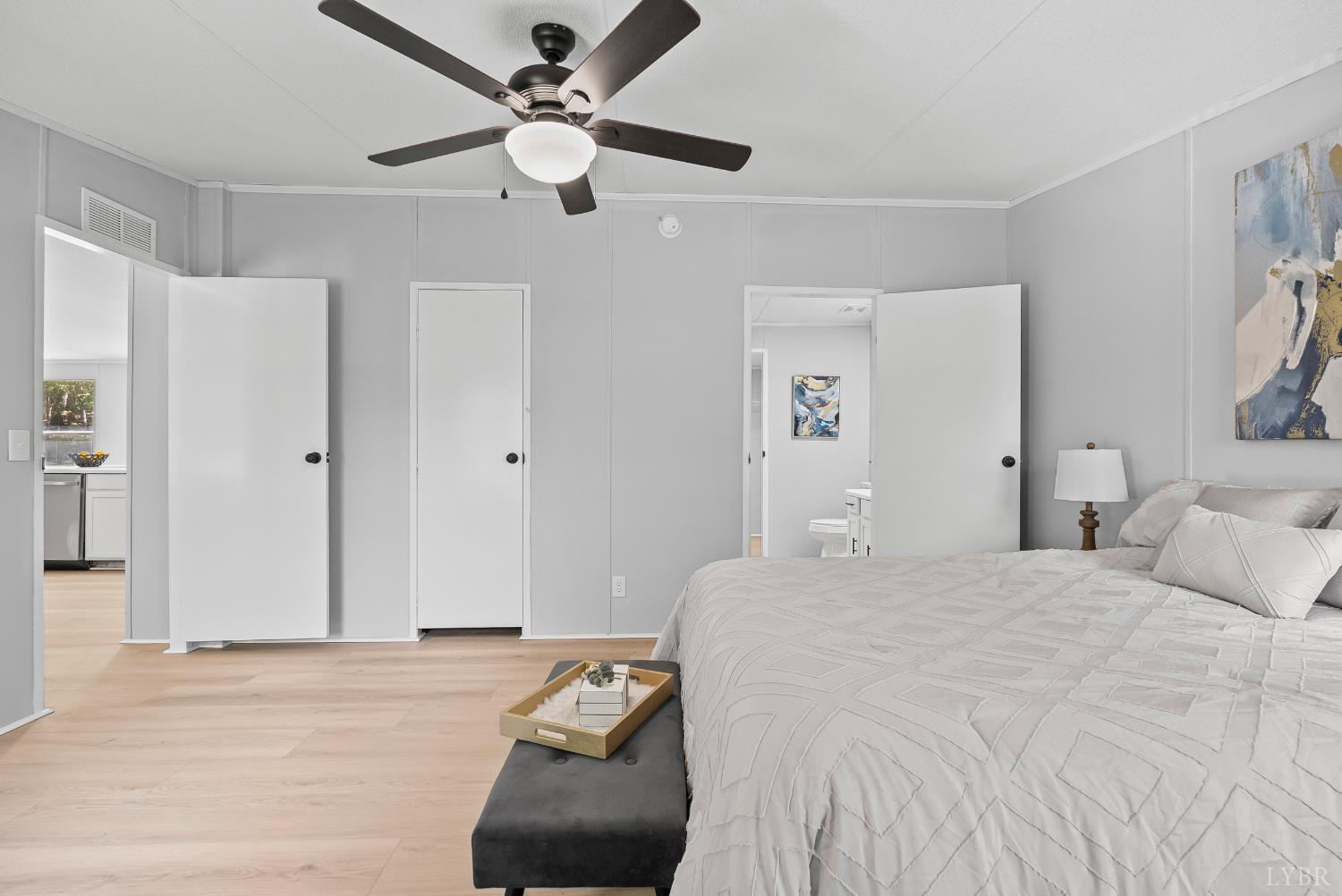 509 Oak Hill Road Prospect, VA 23960 - Photo 18 of 41 a bedroom with a bed and a chandelier