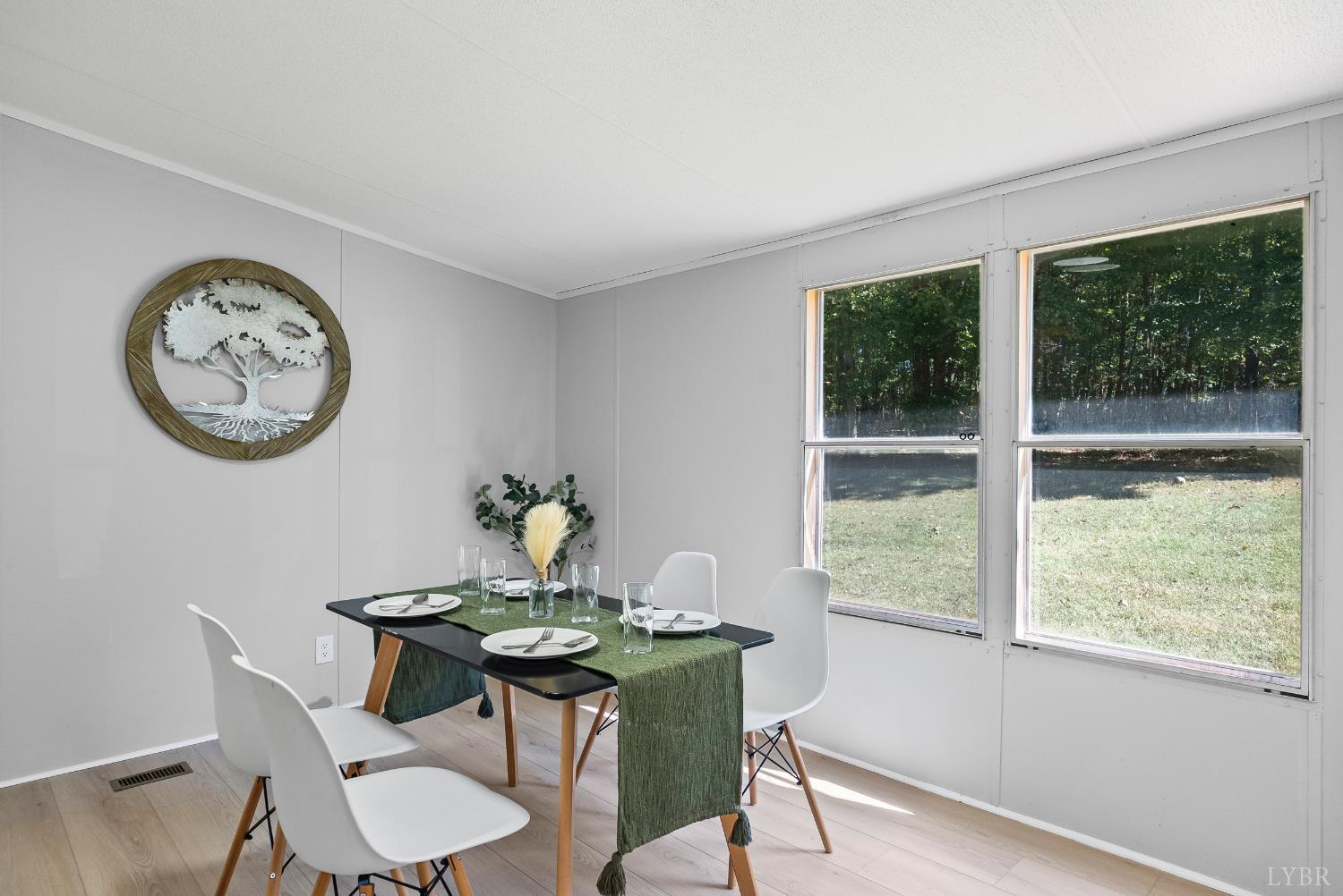 509 Oak Hill Road Prospect, VA 23960 - Photo 6 of 41 a view of a dining room with furniture window and wooden floor
