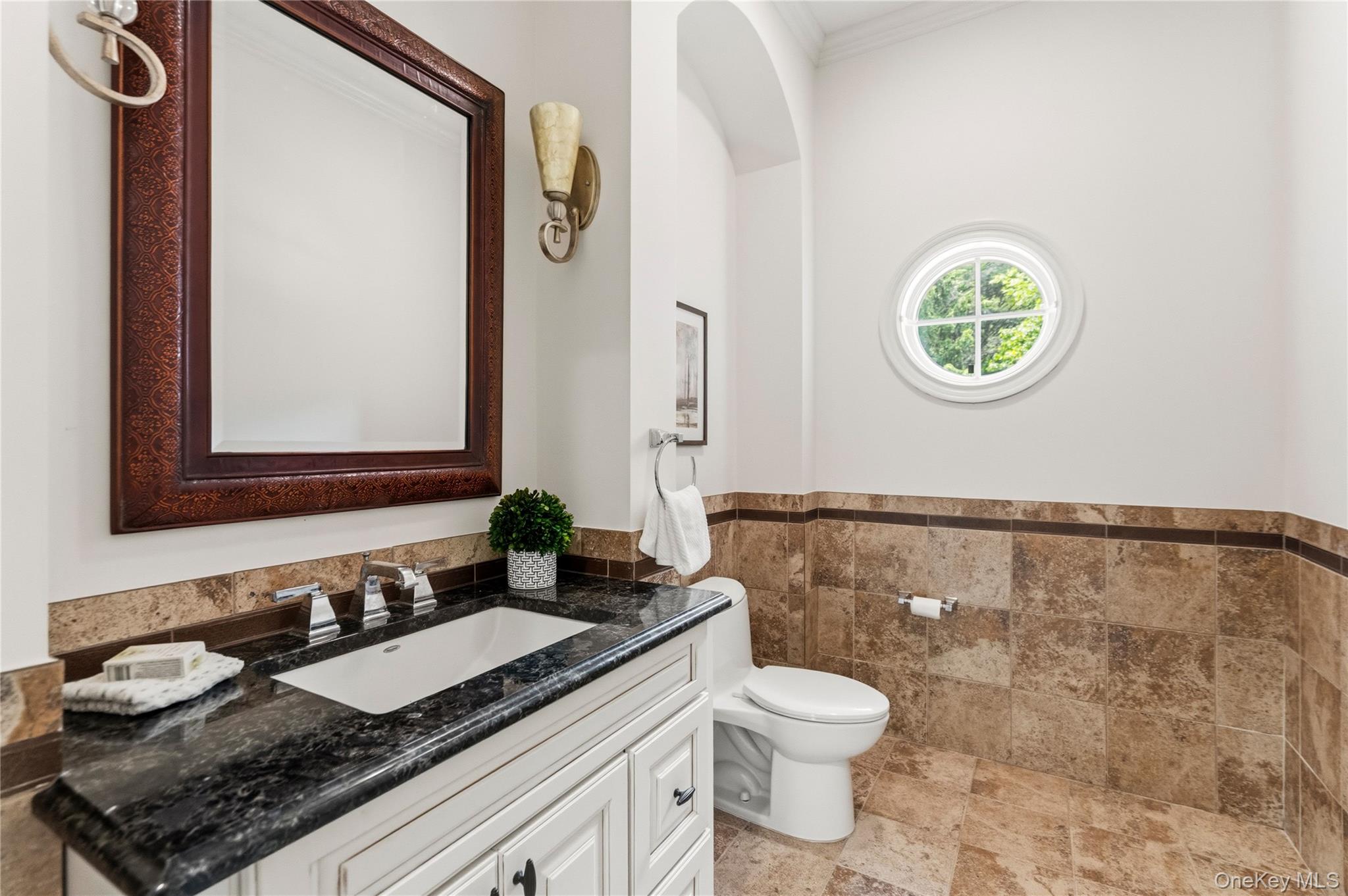 1960 Midlane Road South Syosset, NY 11791 - Photo 13 of 46 a bathroom with a granite countertop toilet sink and mirror