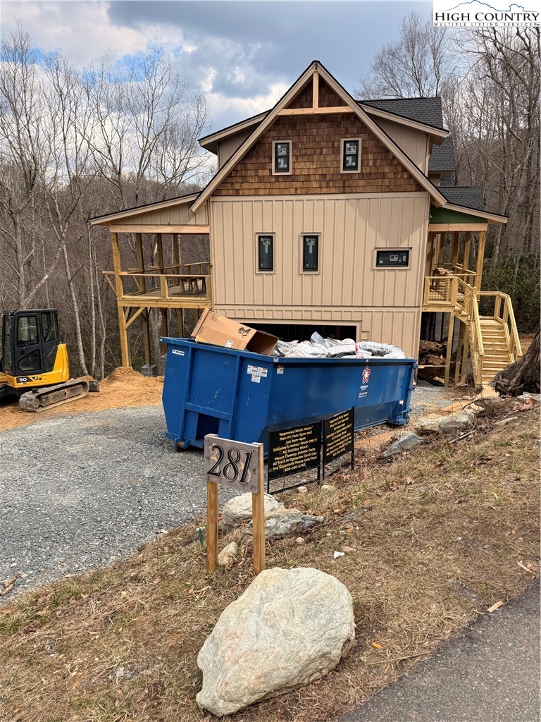 Lot 39 Mossy Creek Boone, NC 28607 - Photo 28 of 50 a view of house with backyard outdoor seating and barbeque oven