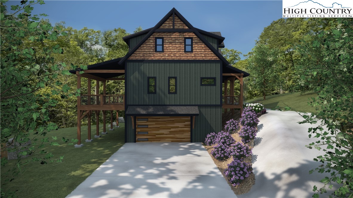 Lot 39 Mossy Creek Boone, NC 28607 - Photo 3 of 50 a front view of a house with a yard
