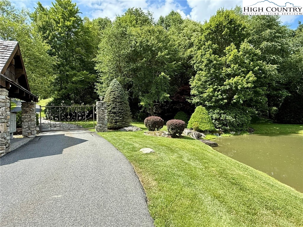 Lot 39 Mossy Creek Boone, NC 28607 - Photo 10 of 50 a view of a street with a building and a tree
