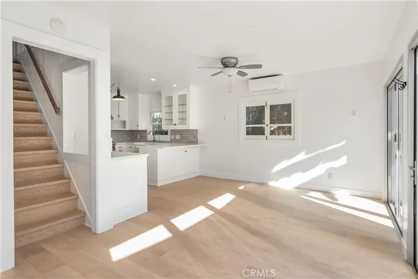 a view of a kitchen with a sink and dishwasher