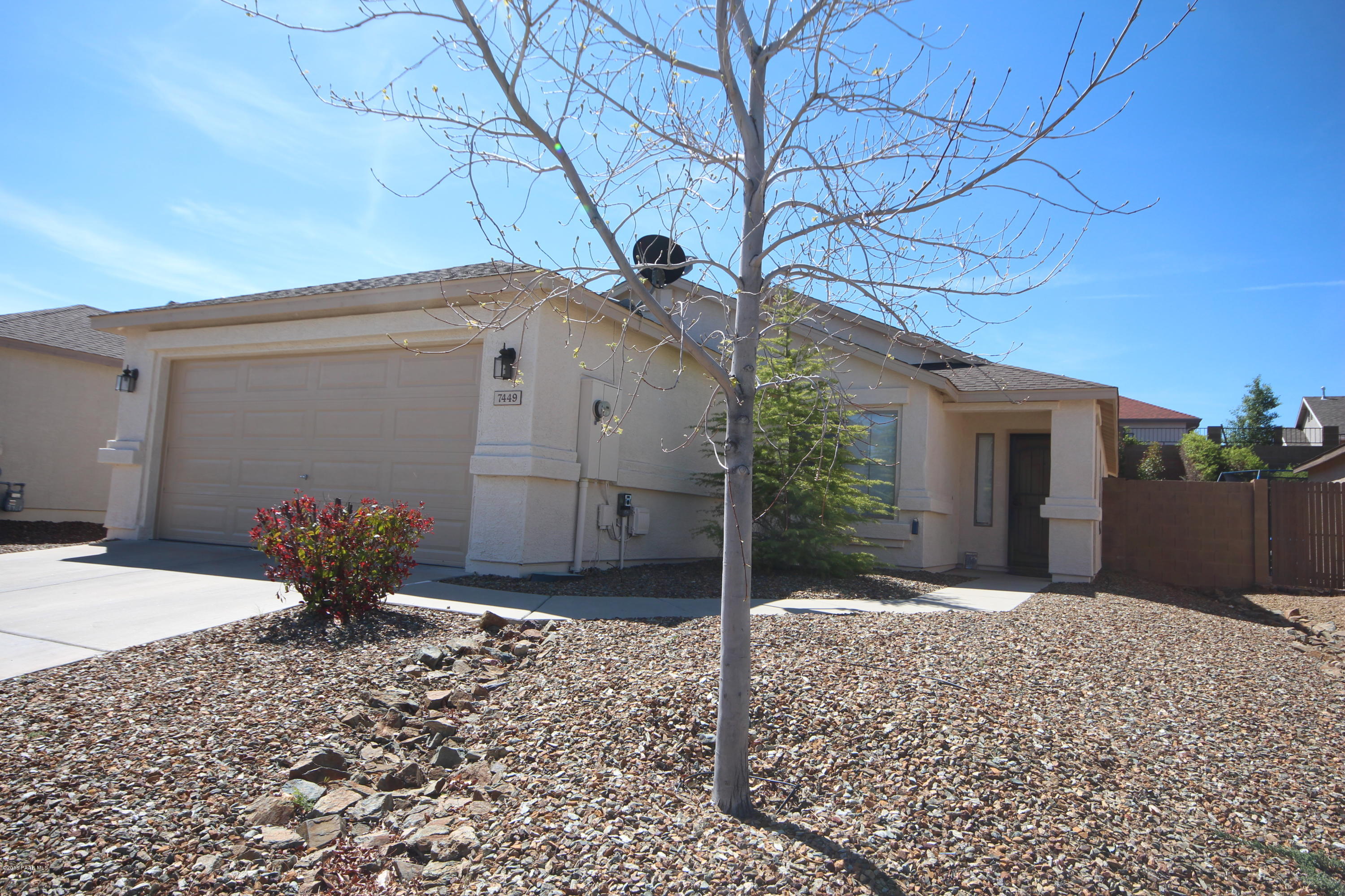 7449 East Plateau Ridge Road Prescott Valley, AZ 86315 - Photo 2 of 17 a view of a house with backyard