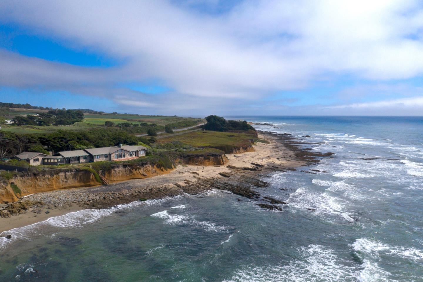 12871 Cabrillo Highway Pescadero, CA 94060 - Photo 2 of 3 a view of a lake with sunset