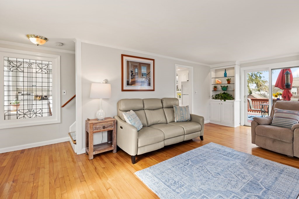 38 Magnolia Road Milton, MA 02186 - Photo 6 of 34 a living room with furniture and a couch