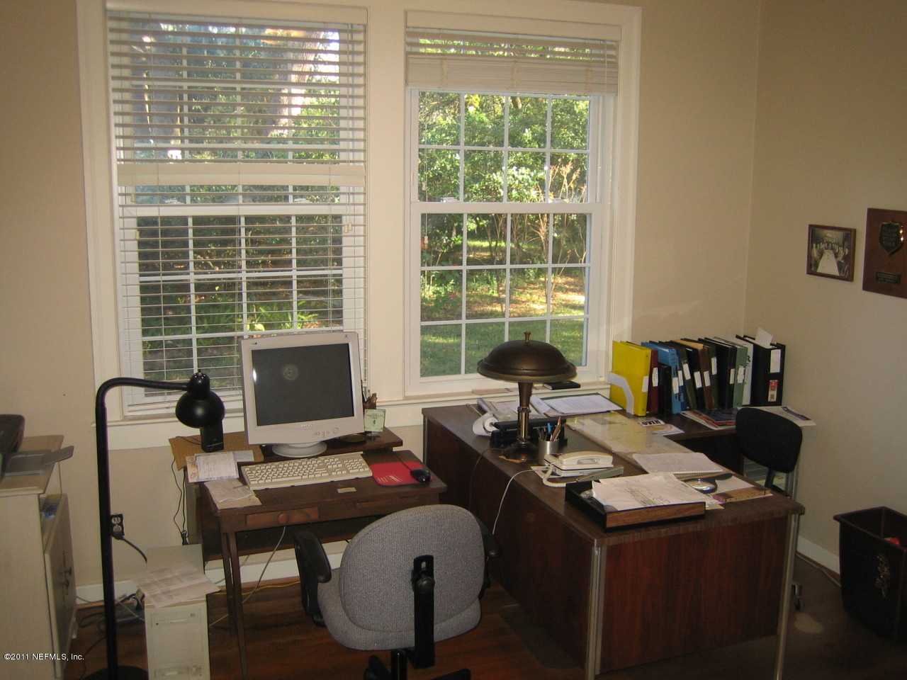 3053 Jolly Road Jacksonville, FL 32207 - Photo 8 of 17 a view of a workspace with furniture and a window