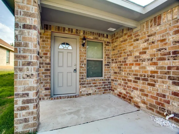 a front view of a house with a shower