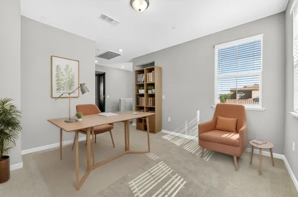a view of a livingroom with furniture