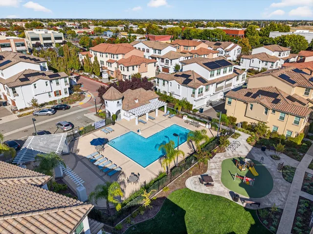 an aerial view of a city with lots of residential buildings