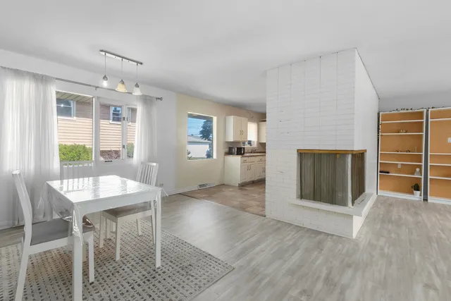a view of a livingroom with furniture and wooden floor
