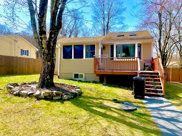 20 Windsor Road Monroe, NY 10950 - Photo 1 of 1 View of front facade featuring a front yard, fence, and a wooden deck