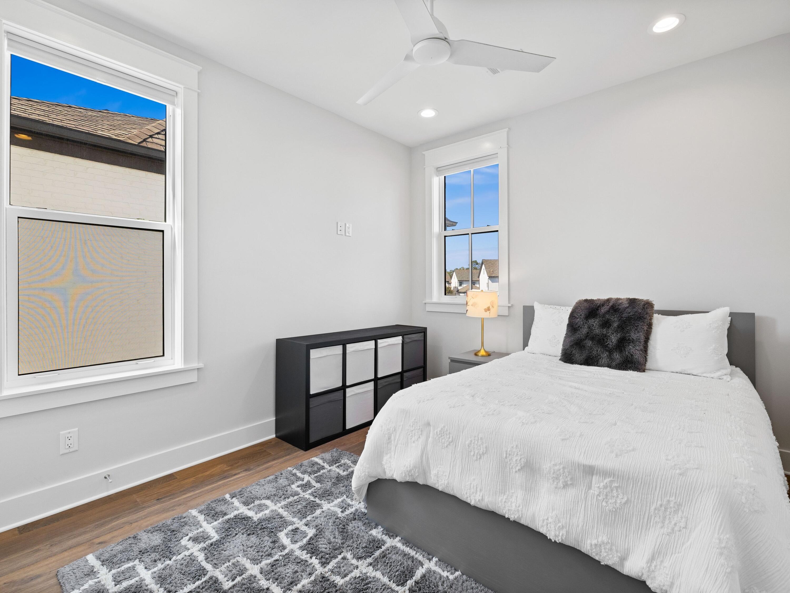 425 Ridgewalk Circle Santa Rosa Beach, FL 32459 - Photo 15 of 22 a bedroom with a large bed and a window