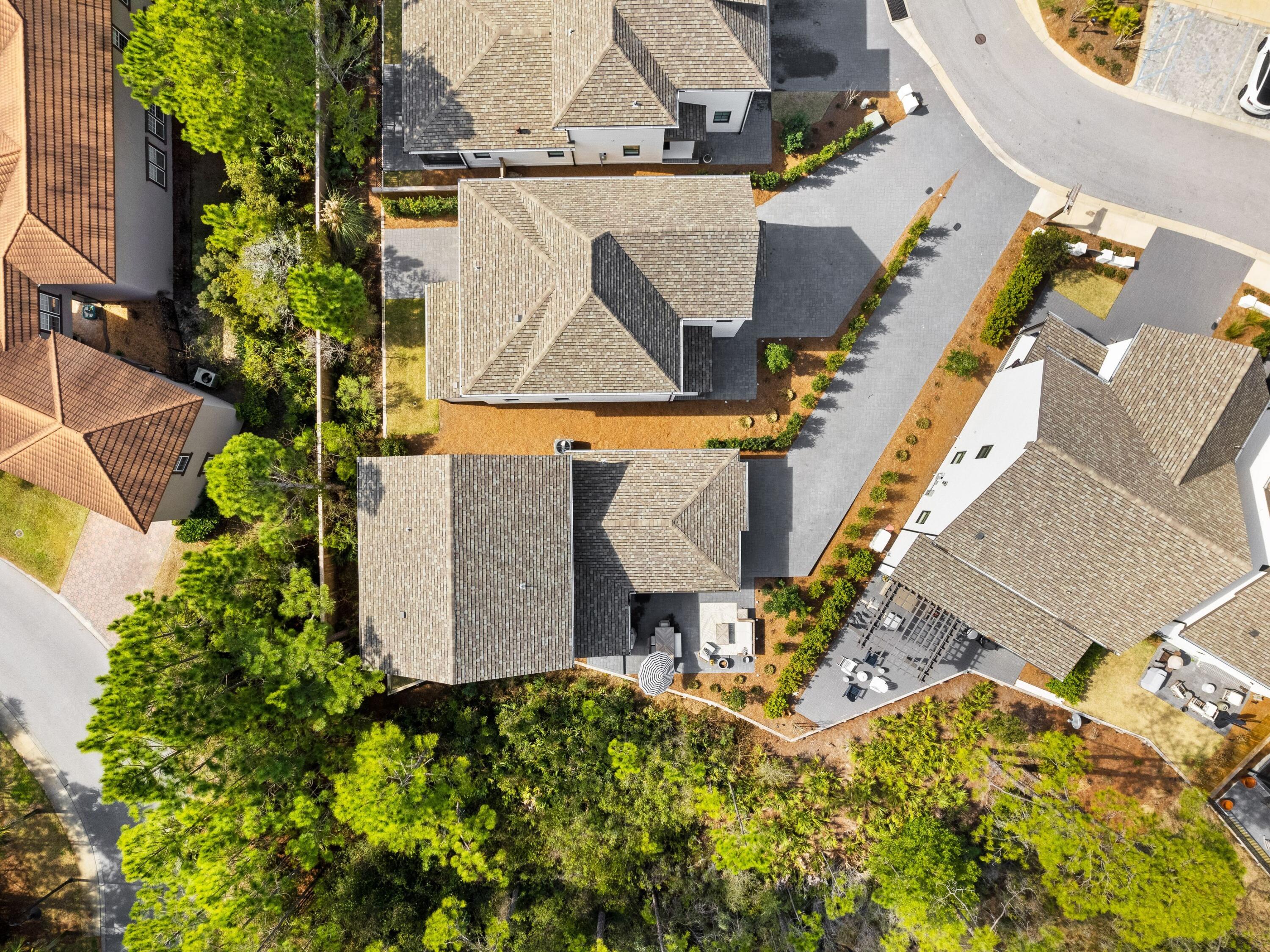 425 Ridgewalk Circle Santa Rosa Beach, FL 32459 - Photo 16 of 22 an aerial view of a house with a yard and a wooden deck