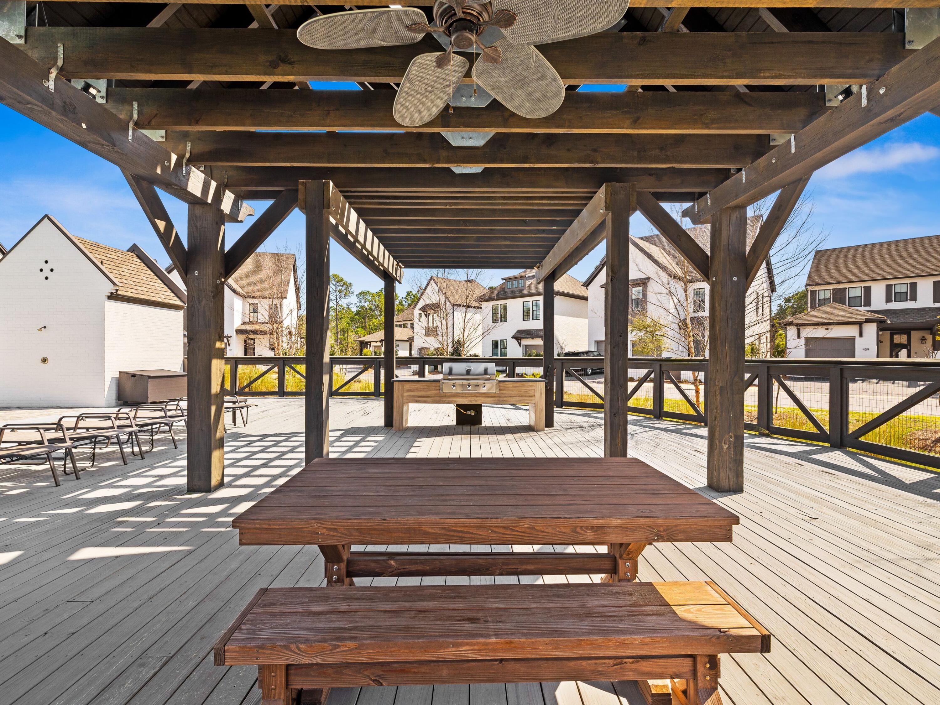 425 Ridgewalk Circle Santa Rosa Beach, FL 32459 - Photo 22 of 22 a view of a patio with wooden floor