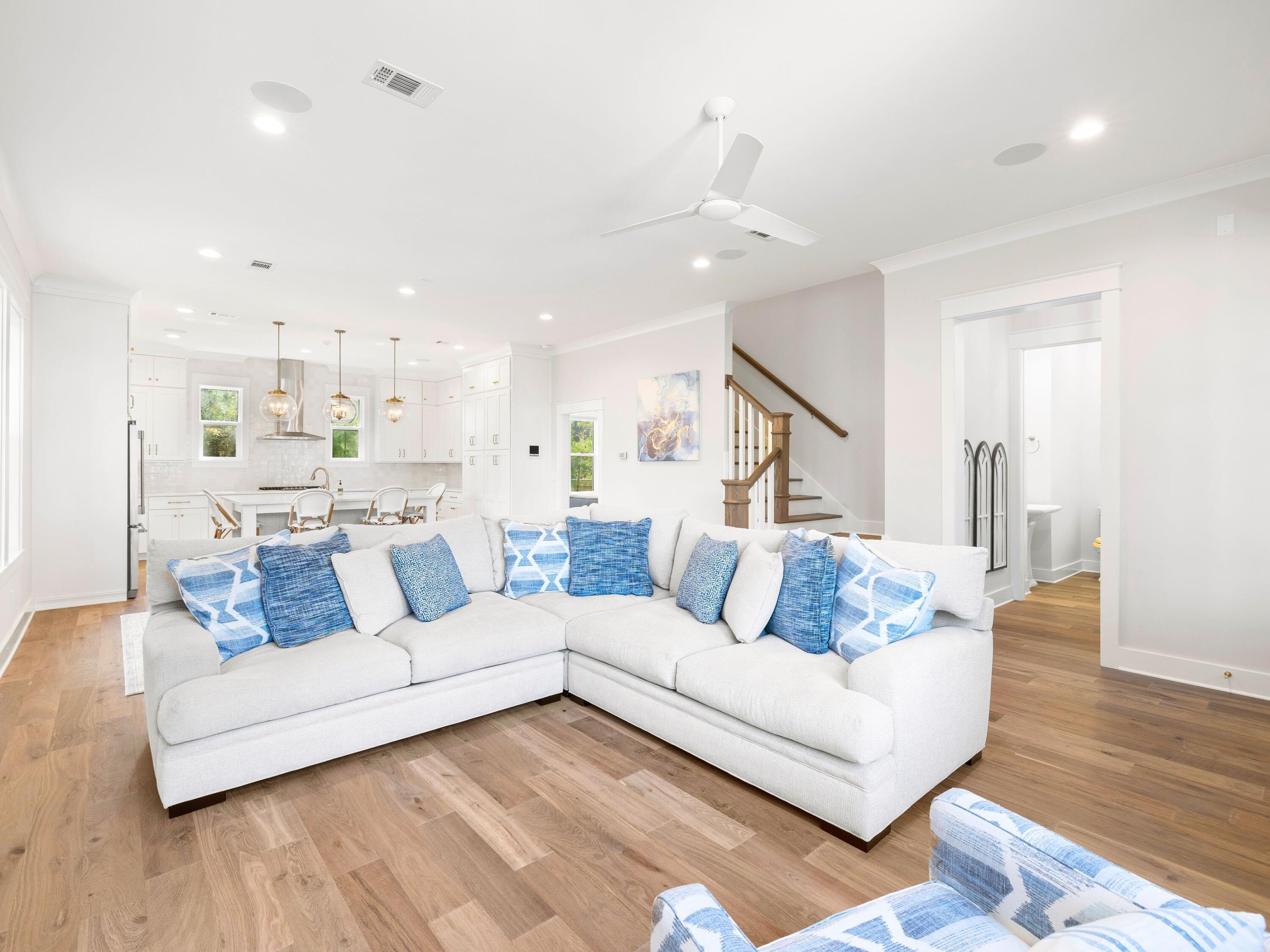 425 Ridgewalk Circle Santa Rosa Beach, FL 32459 - Photo 4 of 22 a living room with furniture and a wooden floor