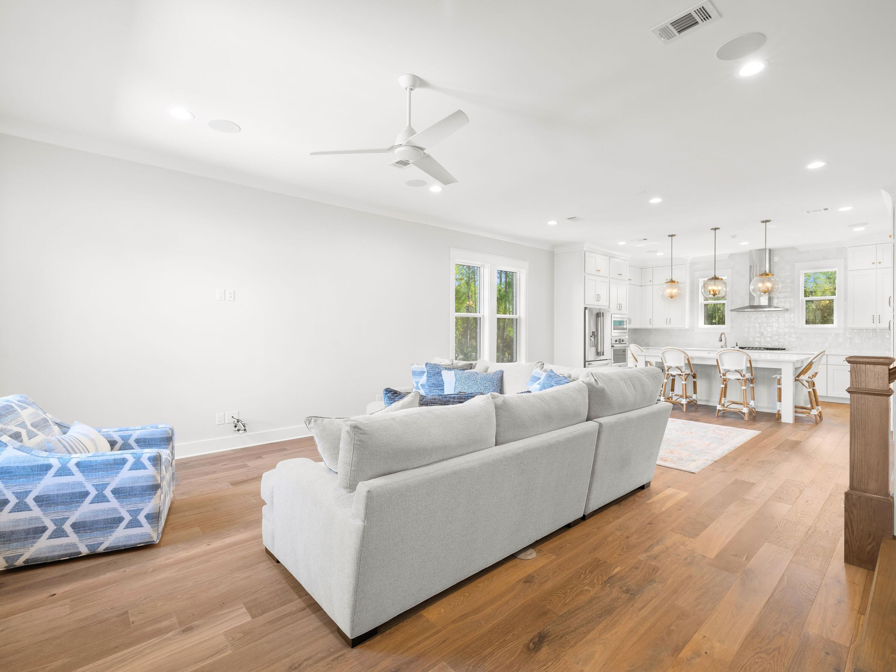 425 Ridgewalk Circle Santa Rosa Beach, FL 32459 - Photo 5 of 22 a living room with furniture and a view of kitchen