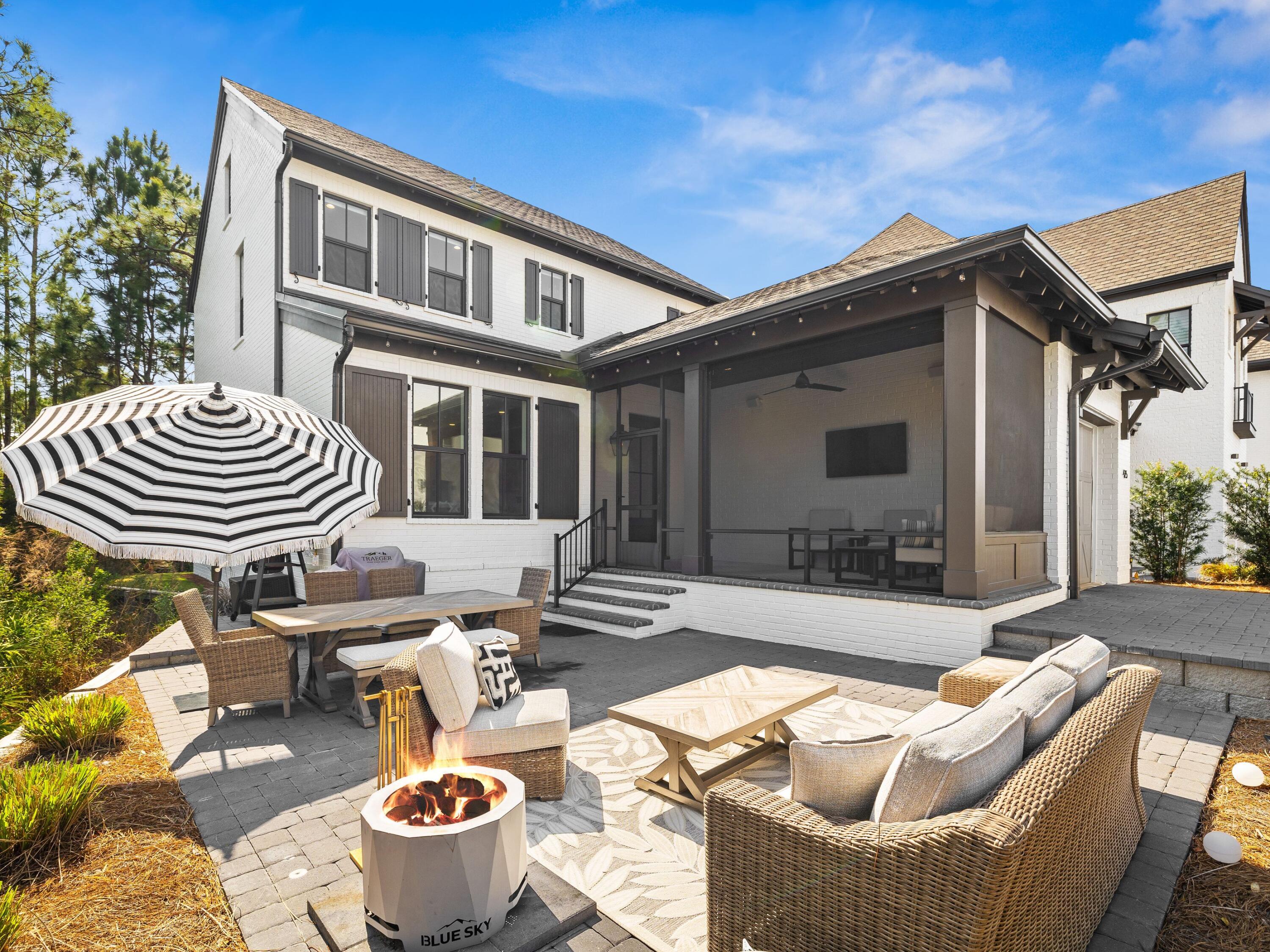425 Ridgewalk Circle Santa Rosa Beach, FL 32459 - Photo 6 of 22 a patio with couches and a fire pit